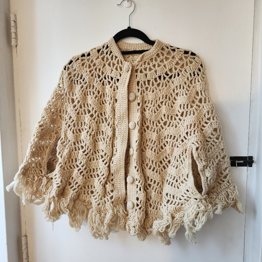 Beautiful beige crocheted poncho
